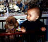 Blake and Josie playing in Blake's bed
